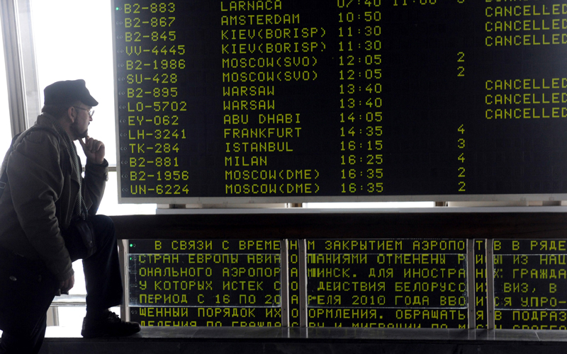 A man looks at a departure board displaying a list of cancelled flights at the international airport outside Minsk on April 17. Air traffic in Europe has been disrupted since Thursday as the cloud of ash from the eruption of the Eyjafjallajokull volcano in southeast Iceland started spreading southwards and eastwards. (AF)