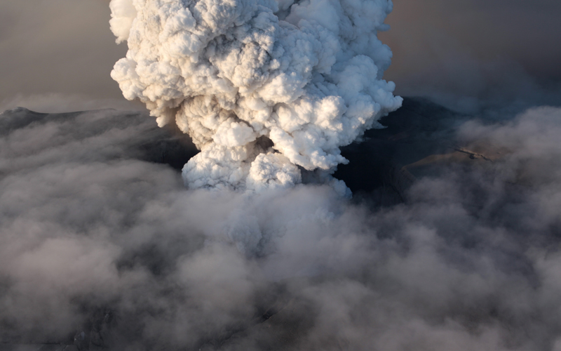 This aerial image shows the crater at the summit of the volcano in southern Iceland's Eyjafjallajokull glacier on April 17. A lingering volcanic ash plume forced extended no-fly restrictions over much of Europe Saturday, as Icelandic scientists warned that volcanic activity had increased and showed no sign of abating - a portent of more travel chaos to come. Although the ash plume has grown, a northerly wind was expected to allow enough visibility for scientists to fly over the volcano Saturday. (AP)