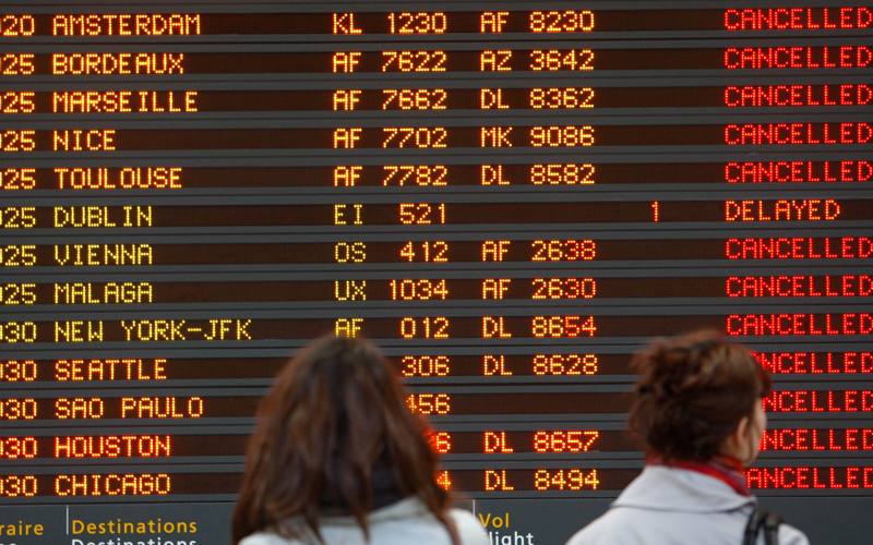 Passengers looks on a departures board at Paris Roissy Airport, as hundreds of commercial flights across northern and eastern Europe are canceled by a drifting plume of volcanic ash originating from a volcanic eruption in Iceland on April 17. The Icelandic volcano that erupted Wednesday has sent an enormous cloud of microscopic ash particles across northern Europe, grounding aircraft across the continent. (AP)