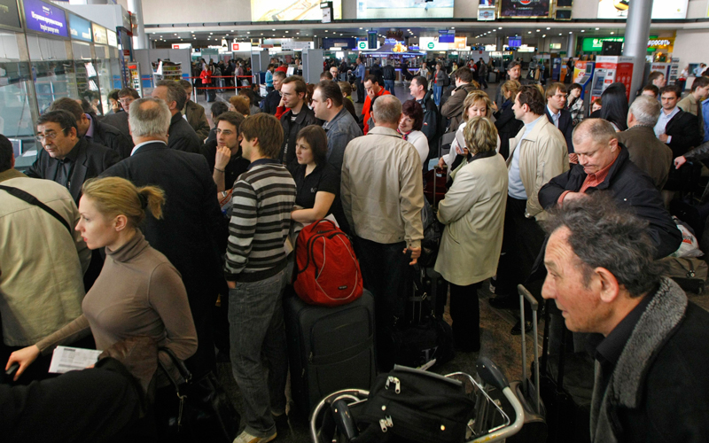 Passengers queue at a ticket office to change or return their tickets at a departure terminal in Sheremetyevo airport, near Moscow on April 17. A lingering volcanic ash plume forced extended no-fly restrictions over much of Europe Saturday, as Icelandic scientists warned that volcanic activity had increased and showed no sign of abating - a portent of more travel chaos to come. (AP)