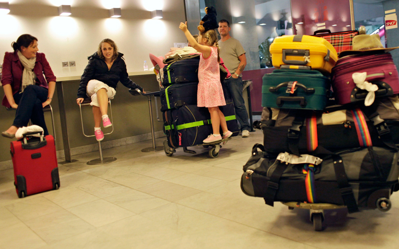 Passengers are seen in the waiting room at Roissy Charles de Gaulle Airport, as hundreds of commercial flights across northern Europe are canceled by a drifting plume of volcanic ash originating from Iceland, outside Paris, 0n April 18. The Icelandic volcano that erupted Wednesday has sent an enormous cloud of microscopic ash particles across northern Europe, grounding aircraft across the continent. (AP)