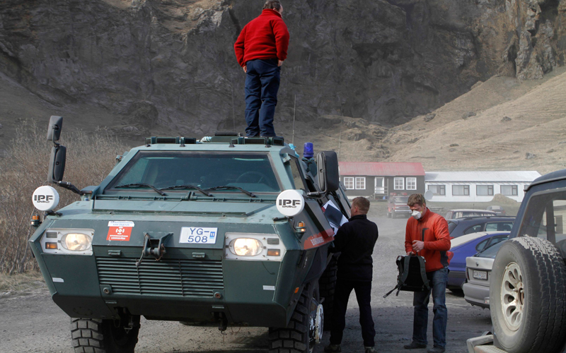 Residents prepare to evacuate in one of the armoured trucks of the Icelandic Civil Defense from the town of Eyjafjoll on April 17. An Icelandic volcano that is spewing ash into the air and wreaking havoc on flights across Europe appeared to be easing up on Saturday but could continue to erupt for days or even months to come, officials said. (Reuters)