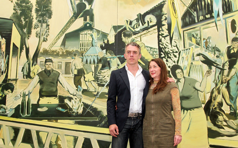 German artist Neo Rauch (R) and his wife Rosa Loy pose in front of Rauch's painting 'Kalimuna' at Pinakothek der Moderne art museum on April 19 in Munich, Germany. Due to his 50th birthday Rauch is honoured by retrospective exhibitions at Leipzig and Munich. The Munich retrospective runs until 15th of August 2010. (Getty Images)