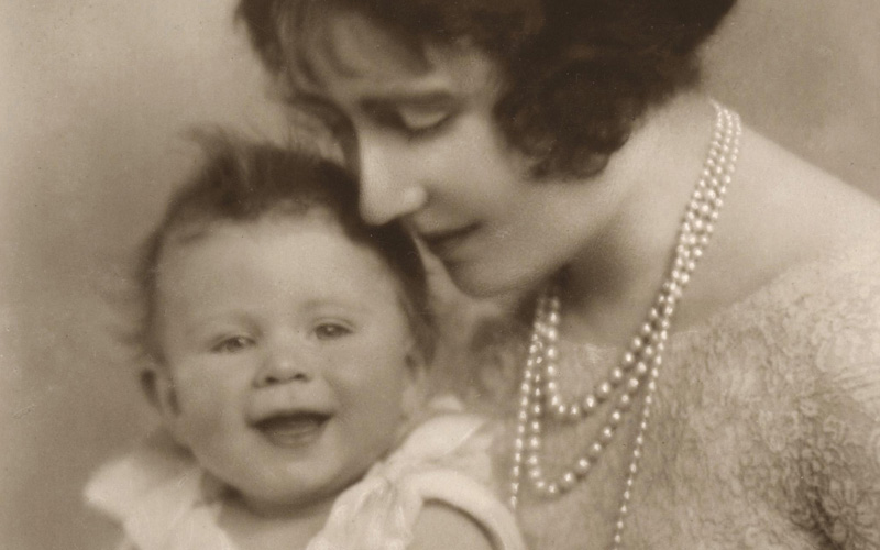 This Feb. 12, 1926 photo provided Wednesday, April 21, 2010 by the Royal Collection shows the Duchess of York, right, with then-Princess Elizabeth, who later became Britain's Queen Elizabeth II.  The Royal Collection released photos of the future Queen's first portrait session on Wednesday to mark her 84th birthday. (AP)