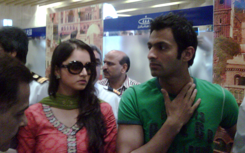 Indian tennis star Sania Mirza arrives with her husband and Pakistani cricketer Shoaib Malik upon their arrival from India at the Karachi International Airport in Karachi on April 22. (AFP)