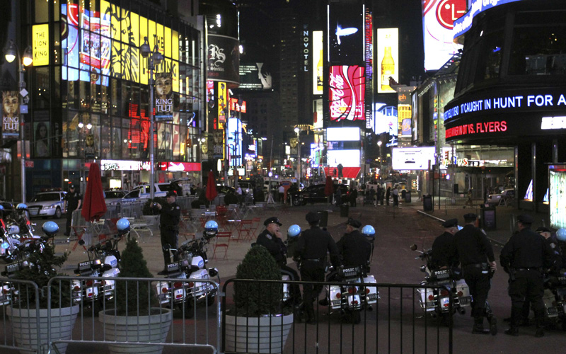 Police stand guard after closing off parts of New York's Times Square May 1, 2010. The dark-colored sports utility vehicle which triggered the evacuation of Times Square on Saturday night was found to contain explosives, gasoline, propane and burned wires, a New York Fire Department officer told Reuters. (REUTERS)