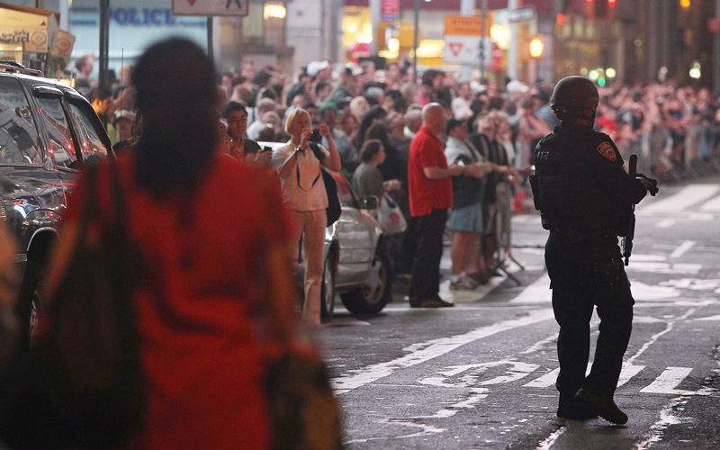 Police keep watch in Times Square after an incident involving a suspicious vehicle caused authorities to shut down parts of Times Square May 1, 2010 in New York City. Both vehicular and pedestrian traffic has been diverted from the area, reportedly causing the cancelation of at least one Broadway show in the area.  (GETTY IMAGES)