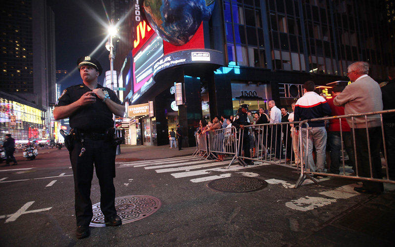 Police keep watch in Times Square after an incident involving a suspicious vehicle caused authorities to shut down parts of Times Square May 1, 2010 in New York City. Both vehicular and pedestrian traffic has been diverted from the area, reportedly causing the cancelation of at least one Broadway show in the area.  (GETTY IMAGES)