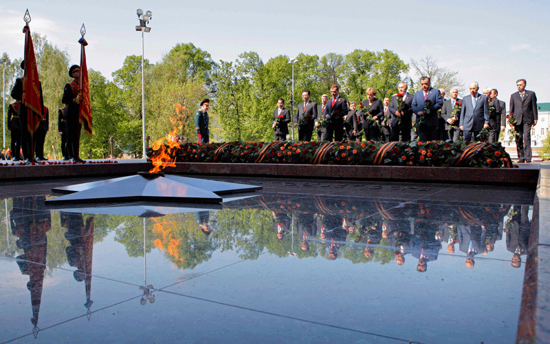 Visiting heads of State and Russia President Dmitry Medvedev, attend a wreath laying ceremony at the Tomb of Unknown Soldier at the Kremlin wall, during the Victory Day Parade, which commemorates the 1945 defeat of Nazi Germany, in Moscow, on May 9, 2010. (AP)