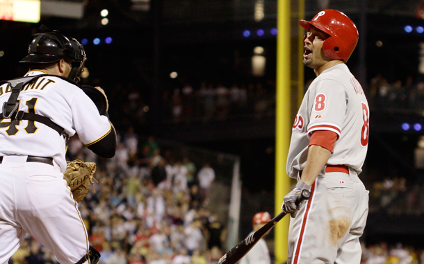 Philadelphia Phillies' Shane Victorino, right, reacts to a called third strike for the last out of the ninth inning to end of the baseball game against the Pittsburgh Pirates in Pittsburgh. The Pirates held on to win 3-2. (AP)