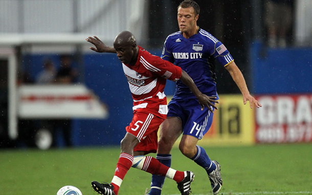 Defenseman Jair Benitez #5 of FC Dallas dribbles the ball against Jack Jewsbury #14 of the Kansas City Wizards at Pizza Hut Park in Frisco, Texas. (AFP)