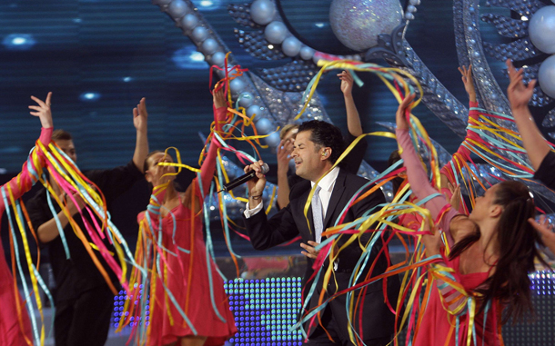 Lebanese singer Ragheb Alama performs during the Miss Lebanon 2010 beauty pageant at the studios of the Lebanese Broadcasting Corporation International (LBCI) in Adma, north of Beirut. (AFP)