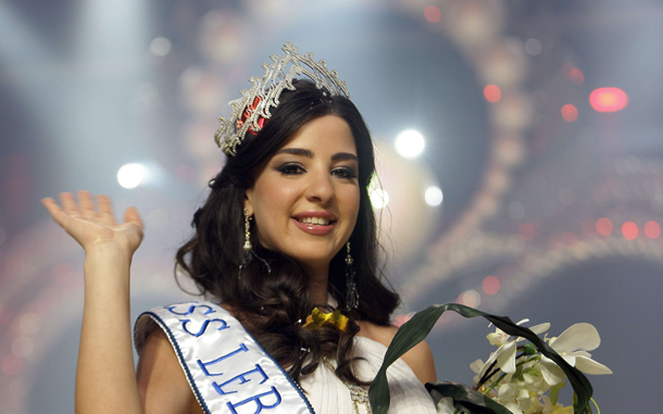 Rahaf Abdallah, 22, waves after winning the Miss Lebanon 2010 beauty contest at the studios of the Lebanese Broadcasting Corporation International (LBCI) in Adma, north of Beirut. (AFP)