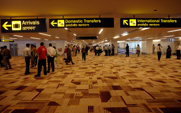 Passengers of an Air India aircraft, the first flight to land at the newly built terminal 3 of the Indira Gandhi International Airport, arrive at the terminal in New Delhi, India. The new terminal has the capacity to handle 34 million passengers annually, becoming the world's third largest passenger terminal on completion. (AP)