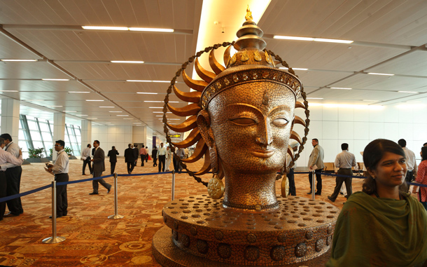 Visitors take a tour of the newly inaugurated Indira Gandhi International Airport Terminal 3 in New Delhi, India. Top government officials unveiled a multibillion dollar, glittering steel and glass new airport terminal in the Indian capital Saturday months ahead of playing hosting to the Commonwealth Games. The ultramodern new terminal was built in just 37 months at a cost of nearly three billion dollars and will be ready for passengers on July 16. (AP)