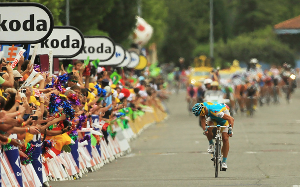 Astana rider Alexandre Vinokourov looks back at the pack moments before winning the 196km Stage 13 of the Tour de France. The hilly stage from Rodez featured a final climb, the category three 1.9-kilometre Saint-Ferreol. Andy Schleck of Saxo Bank continued to hold onto the yellow jersey. The iconic bicycle race will include a total of 20 stages and will cover 3,642km before concluding in Paris. (GETTY IMAGES)