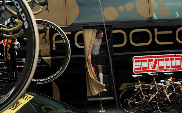 A rider emerges from the team bus of Footon-Servetto before the start of stage Stage 13 of the Tour de France. The hilly stage from Rodez featured a final climb, the category three 1.9-kilometres Saint-Ferreol. While Luxembourg's Andy Schleck of team Saxo Bank continues to wear the yellow jersey, Astana rider Alexandre Vinokourov won the stage.The iconic bicycle race will include a total of 20 stages and will cover 3,642km before concluding in Paris. (GETTY IMAGES)