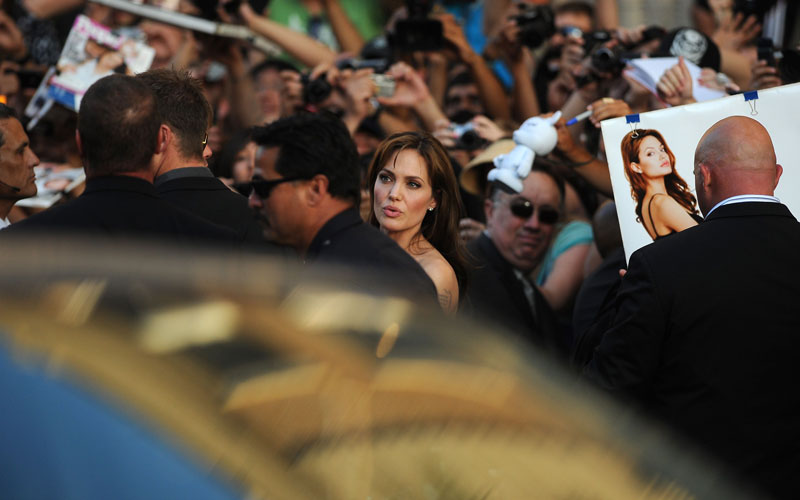 Actress Angelina Jolie greets fans at the premiere of "Salt" on July 19, 2010 at the Grauman's Chinese Theatre in Hollywood. (AFP)