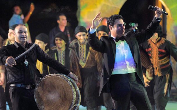 Lebanese singer Assi El-Hellani (R), performs on the main stage at the Zouk Mikael International Festival, in Zouk Mikael, north of Beirut, Lebanon. The annual Festival runs from 09 July to 28 July 2010. (EPA)