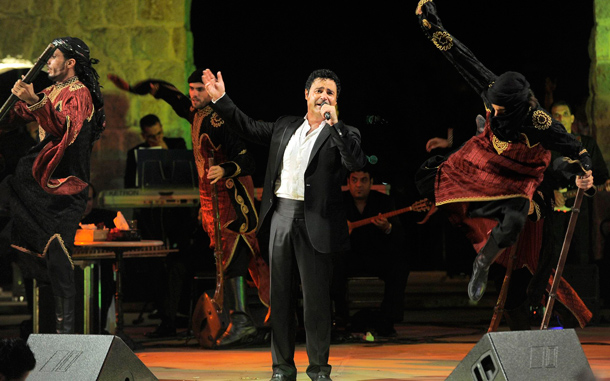 Lebanese singer Assi El-Hellani, performs on the main stage at the Zouk Mikael International Festival, in Zouk Mikael, north of Beirut, Lebanon. The annual Festival runs from 09 July to 28 July 2010. (EPA)