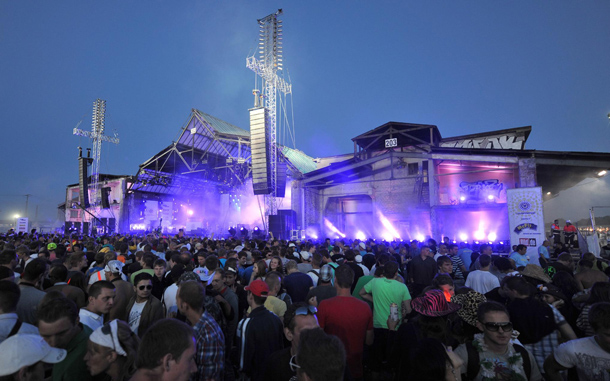 The Love Parade music festival continues in spite of casualties after a stampede, Duisburg, Germany. At least 18 people died and 80 were injured  when revelers at the Love Parade music festival in the western German city of Duisburg set off a stampede in a crowded access tunnel, police said. (EPA)