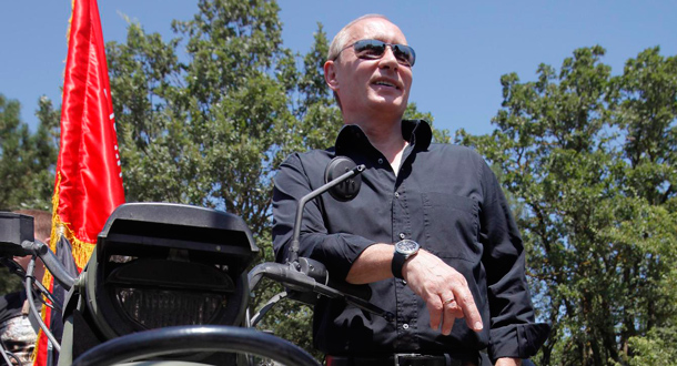 Russian Prime Minister Vladimir Putin attends a meeting of motor bikers at their camp at Gasfort Lake near Sevastopol in Ukraine's Crimea Peninsula. (EPA)