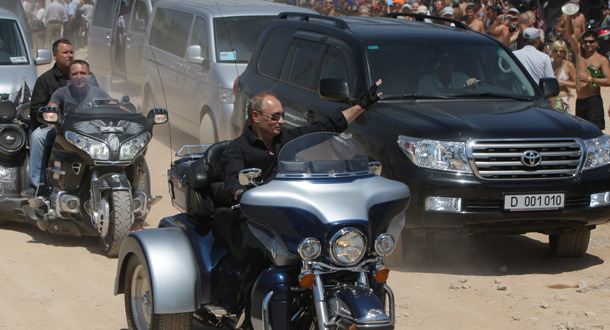 Russia's Prime Minister Vladimir Putin arrives for the meeting with Russian and Ukrainian motorbikers at their camp near Sevastopol in Ukraine's Crimea. (AFP)