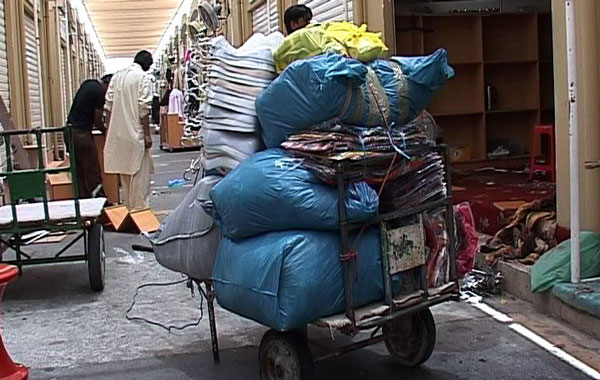 Scenes of traders pakcing to move from the the temporary souq near Nakheel
centre to the new market. (REHNA KC)