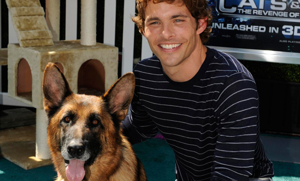 Cast member James Marsden is seen with a German Shepherd dog as he attends the premiere of the film "Cats & Dogs, The Revenge of Kitty Galore" in Los Angeles. (REUTERS)