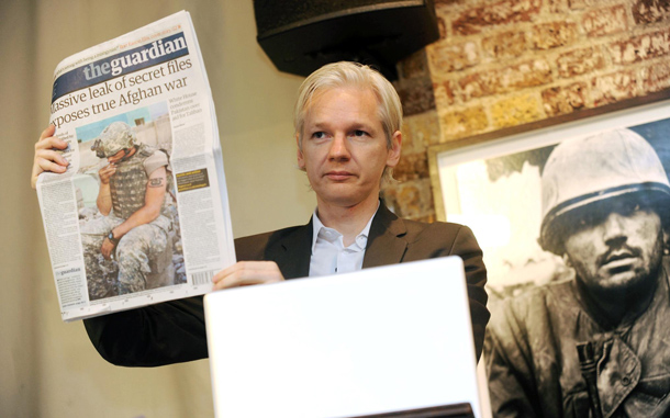 WikiLeaks founder Julian Assange shows an issue of the British daily The Guardian during a press conference at the Frontline Club in London, Britain to discuss about the 75,000 Afghan war documents that the organization made available to The New York Times, The Guardian of London and Germany's Der Spiegel. Documents were published on 25 July. 'There is no perfect information but in the end the truth is all we have,' Assange said. 'We would like to see this material, the revelations that this material gives, taken seriously, investigated by governments and new policies put in place as a result, if not prosecutions of those people that committed abuses.' WikiLeaks says it will publish an additional 15,000 documents once they have been scrubbed of any names that could potentially put people in danger. (EPA)