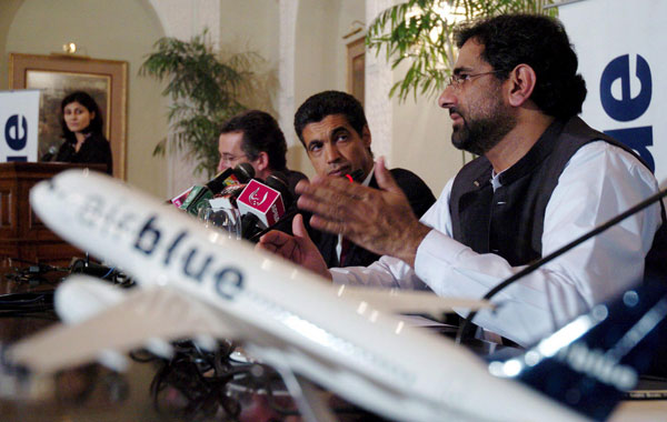 A file picture dated 04 August 2005 shows Chief operational officer of Air Blue, Shahid Khakan Abbasi, talking with journalists as Vice President of Airbus sales, Abdullah Sabai (2 R), looks on during a press conference in Islamabad Pakistan. An Airblue plane carrying 159 passengers crashed in the hills in capital Islamabad, killing at least 10 passengers.  (EPA)