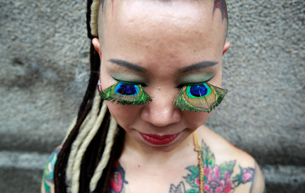 An artist displays her makeup at the 2010 Taiwan International Tattoo Convention in Taipei. (REUTERS)