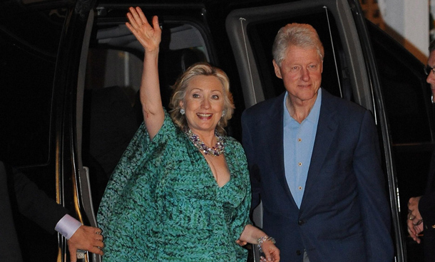 Former US president Bill Clinton (R) and his wife, US Secretary of State Hillary Rodham Clinton Hillary Rodham Clinton (L), arrive for a pre-wedding party at the Beekman Arms Inn Rhinebeck, New York. (EPA)