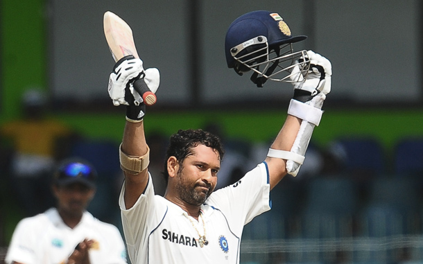 Indian cricketer Sachin Tendulkar raises his bat and helmet as he is applauded by the crowd for completing a double century (200 runs) during the fourth day of the second Test match between Sri Lanka and India at The Sinhalese Sports Club Ground in Colombo. Sri Lankan cricketers Muttiah Muralitharan and Lasith Malinga claimed 15 of the 20 Indian wickets in the first Test in Galle last week, which Sri Lanka won by 10 wickets to take a 1-0 lead in the three-match series. (AFP)