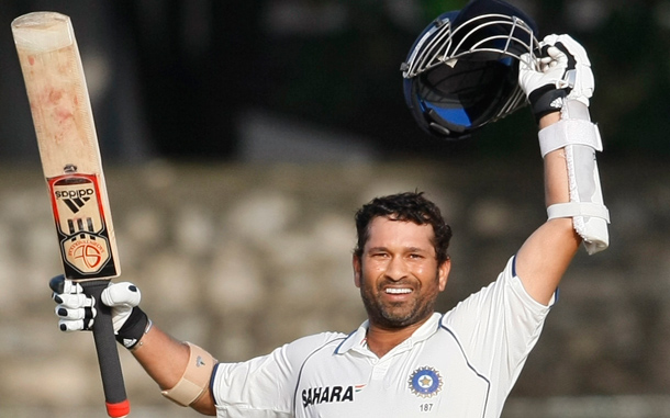 Indian cricketer Sachin Tendulkar celebrates after scoring a century during the third day of the second test cricket match between India and Sri Lanka in Colombo, Sri Lanka. (AP)