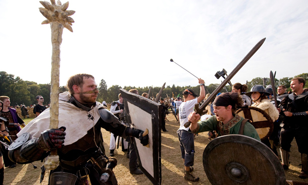 People in costumes participate in "Conquest 2010 LARP" (Live Action Role Play) in the northern German village of Brokeloh near Hanover. About 7000 participants from Europe, the United States and Japan dressed up as fantasy characters such as knights and trolls to take part in the three-day role playing event. (REUTERS)