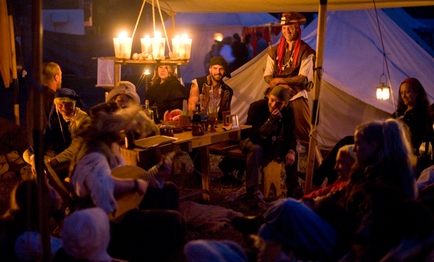 People in costumes participate in "Conquest 2010 LARP" (Live Action Role Play) in the northern German village of Brokeloh near Hanover. About 7000 participants from Europe, the United States and Japan dressed up as fantasy characters such as knights and trolls to take part in the three-day role playing event. (REUTERS)