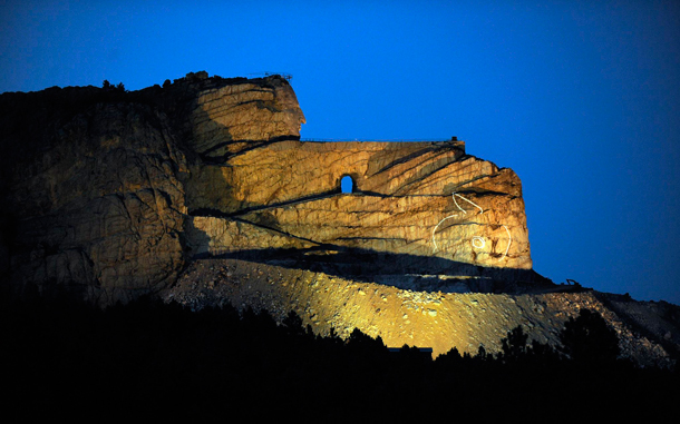 The Crazy Horse Memorial at Thunder Mountain is lit up in the evening prior to the laser light show in the Black Hills near Custer, South Dakota, USA. The massive undertaking, originally the creation and idea of Polish-American artist and sculptor Korczak Ziokowski, who started the undertaking in 1948, might be the largest sculpture in the world measuring when completed at 641 feet (195 m) wide and 563 feet (172 m) high. The head of Crazy Horse is 87 feet (27 m) high. (EPA)