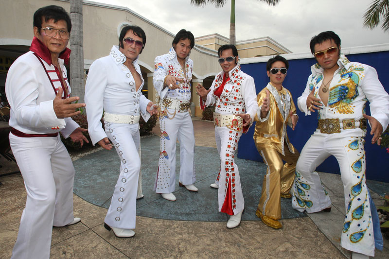 Filipino Elvis Presley impersonators pose prior to a performance. (AP)