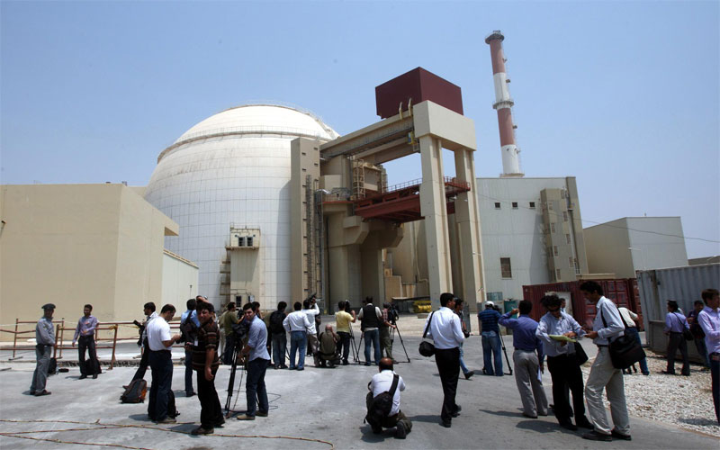 Media make reports in front of the nuclear plant in Bushehr , southern Iran. (EPA)