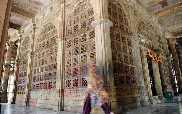 A Muslim woman leaves after praying at the shrine of Maqbul E-Alam, the grandson of Muslim Saint Shaikh Shah Alam, at the Shah Alam Roza in Ahmedabad. Shah Alam Dargah is some 600 years old and is thronged by thousands of Muslims during the Holy month of Ramadan. (AFP)