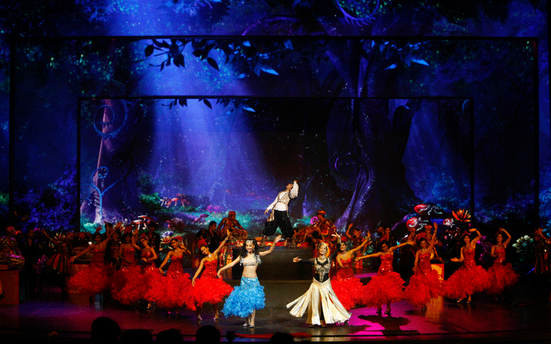 Dancers perform before Indian music composer A.R. Rahman presented the theme song for the upcoming Commonwealth Games in Gurgaon, India. (AP)