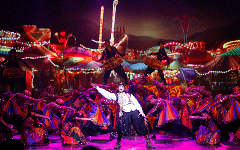 Dancers perform before Indian music composer A.R. Rahman presented the theme song for the upcoming Commonwealth Games in Gurgaon, India. (AP)