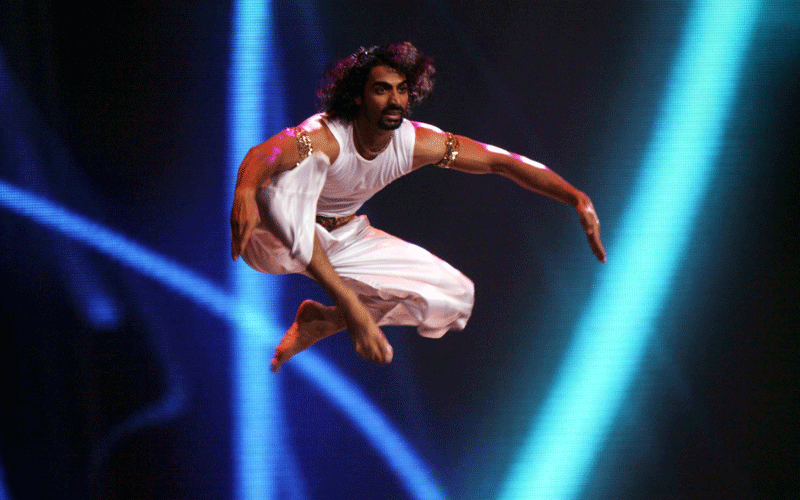 Indian artists perform during the official launch of the Commonwealth Games Delhi 2010 theme song in New Delhi, India. (EPA)