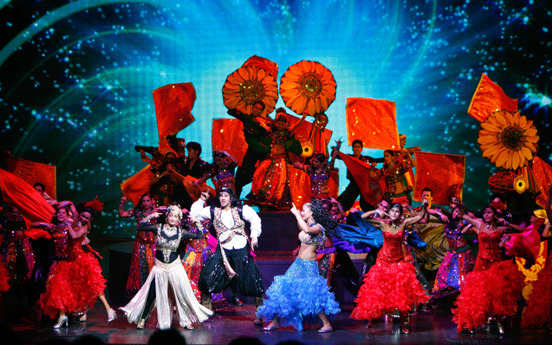 Dancers perform before ahead of Indian music composer A.R. Rahman's unveiling of the theme song for the upcoming Commonwealth Games in Gurgaon, India. (AP)