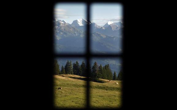 View out of a window on the mountain pasture Unterbaergli above Sigriswil. (REUTERS)