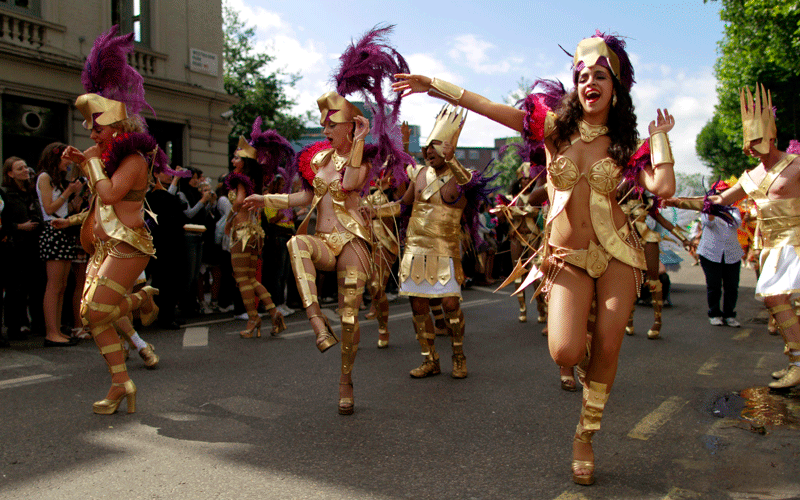 Costumed revellers perform in the Notting Hill Carnival in London. (AP)