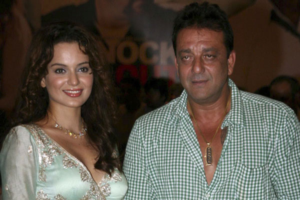 Indian Bollywood actor Sanjay Dutt (R) poses with actress Kangana Ranaut as he hosts an Iftar party in Mumbai late August 30, 2010. (AFP)