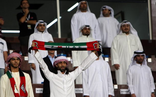 UAE fans support their team during the friendly soccer match between the United Arab Emirates and Kuwait at the Al-Nahyan stadium in Abu Dhabi, United Arab Emirates. (EPA)