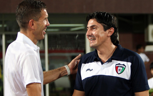 UAE National team's coach Srecko Katanec (L) shakes hand with his Kuwaiti counterpart Goran Tufegdzic (R) during their friendly soccer match at Al-Nahyan stadium in Abu Dhabi, United Arab Emirates. (EPA)